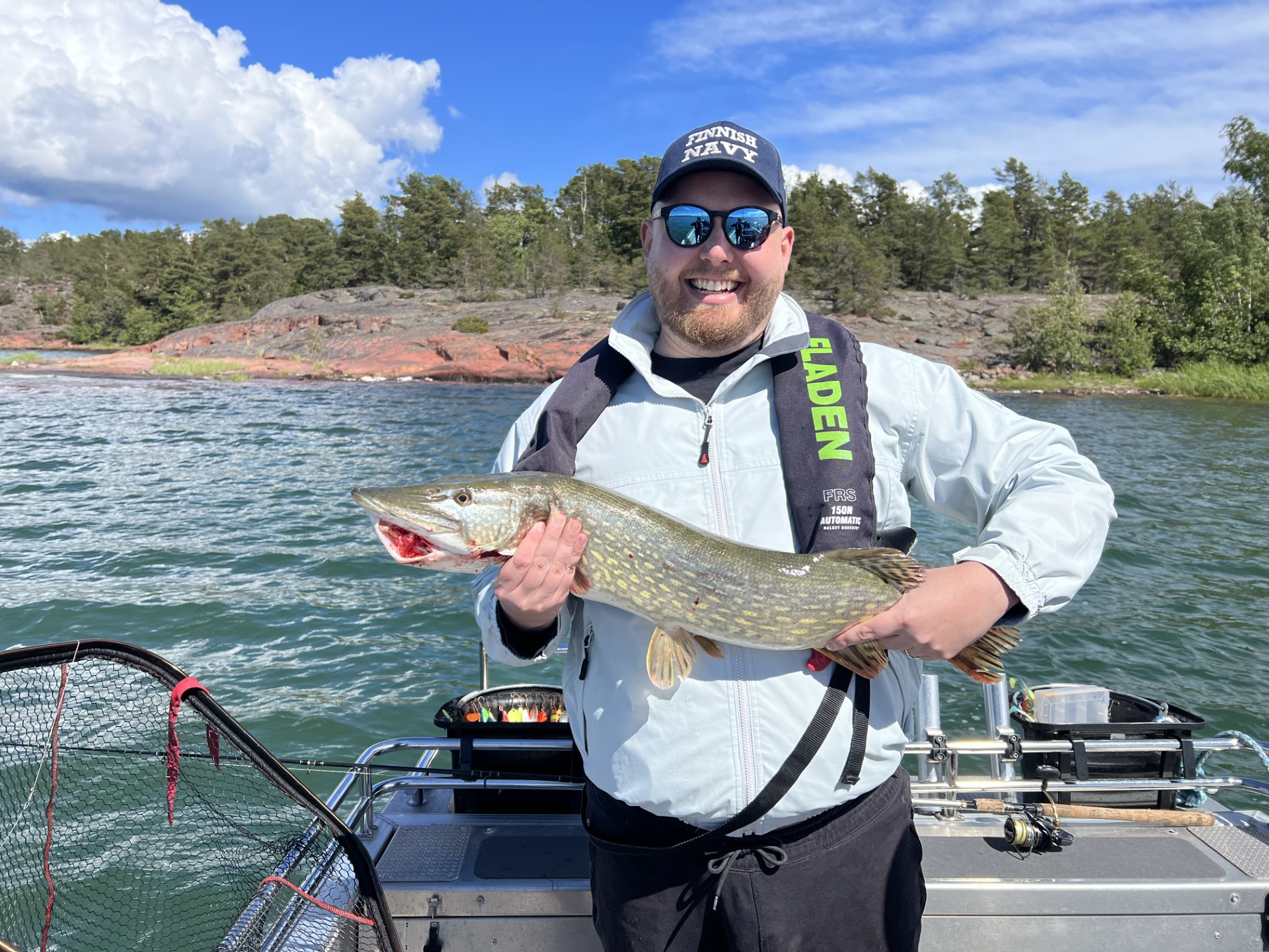 Robbie with a fish he has caught